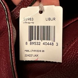 Coach medium size bag in burgundy. NWT